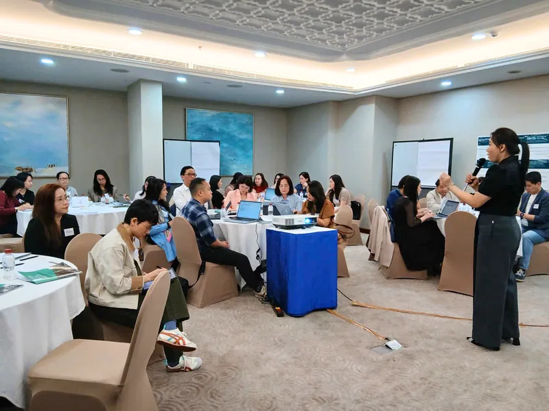 Participants working in groups at the Foundation of Change workshop