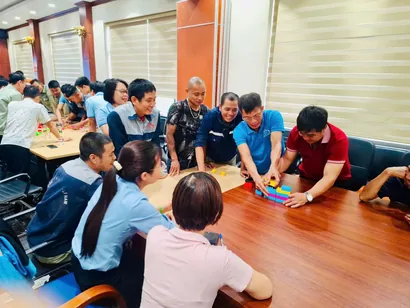 Employees discussing at the workshop