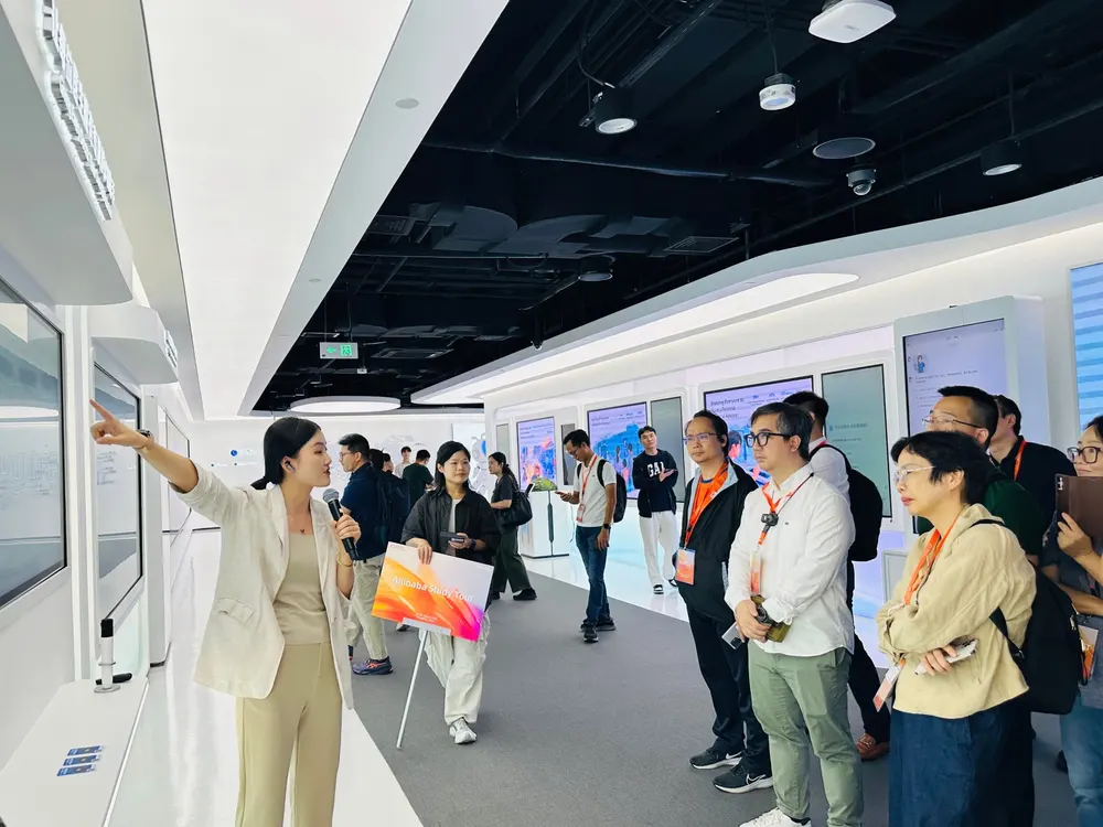 Alibaba Study Tour delegation at the Alibaba Cloud showroom
